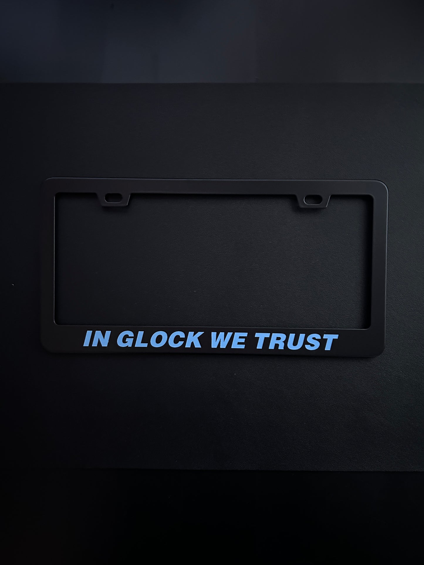 In Glock We Trust Black Stainless Steel License Plate Frame