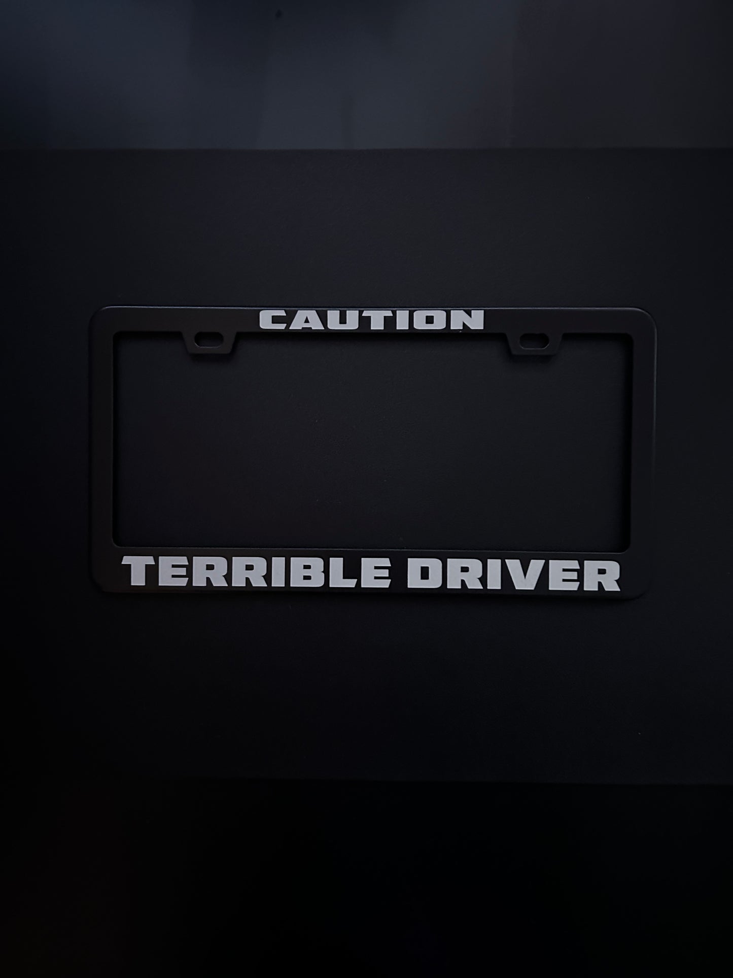 Caution Terrible Driver Black Stainless Steel License Plate Frame