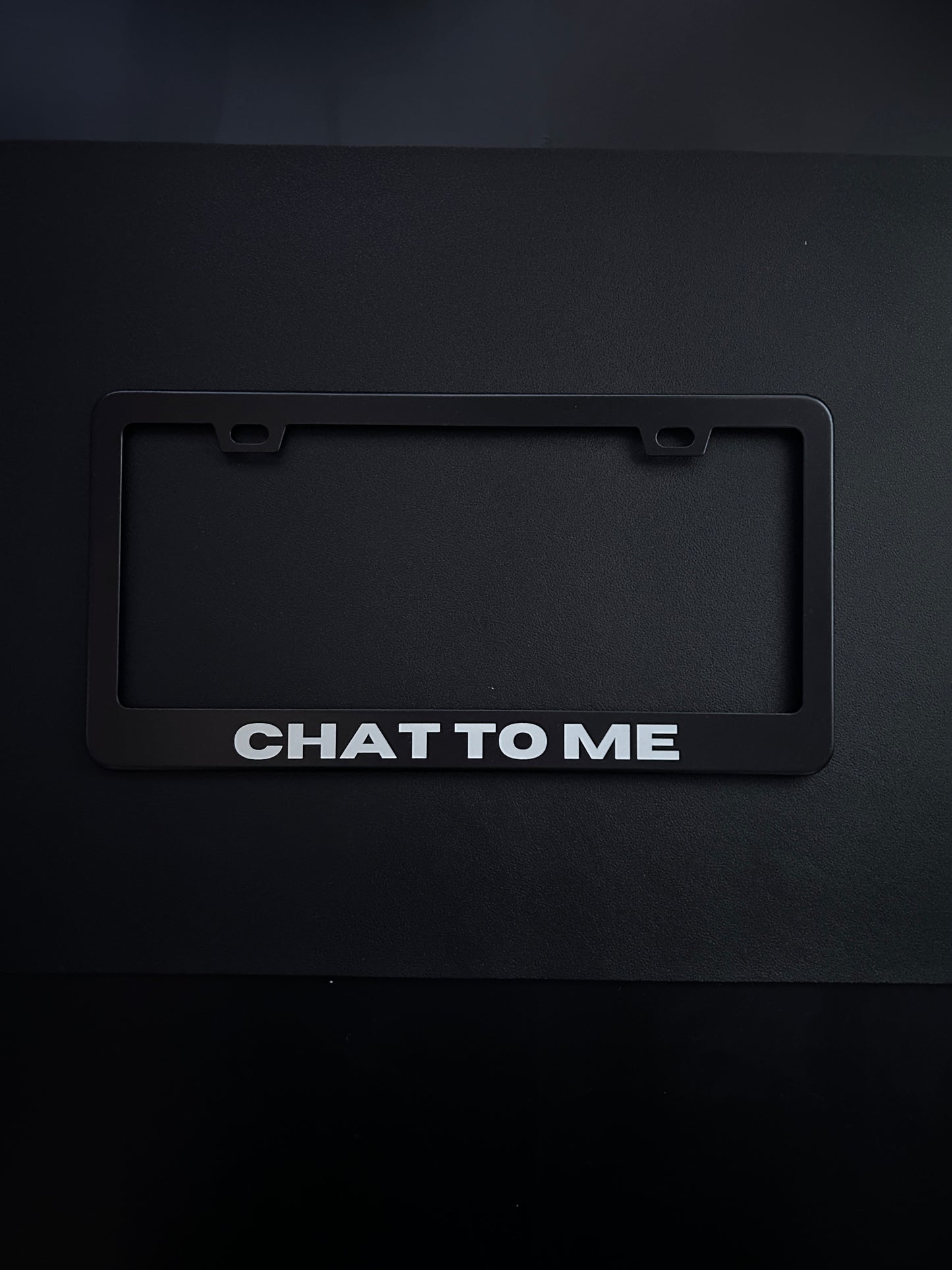 Chat To Me Black Stainless Steel License Plate Frame