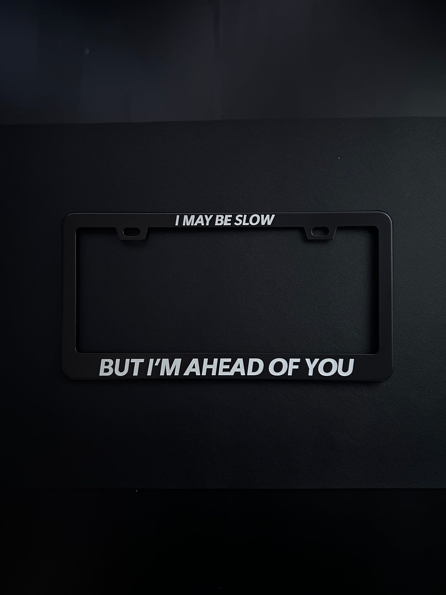I May Be Slow But I'm Ahead Of You Black Stainless Steel License Plate Frame