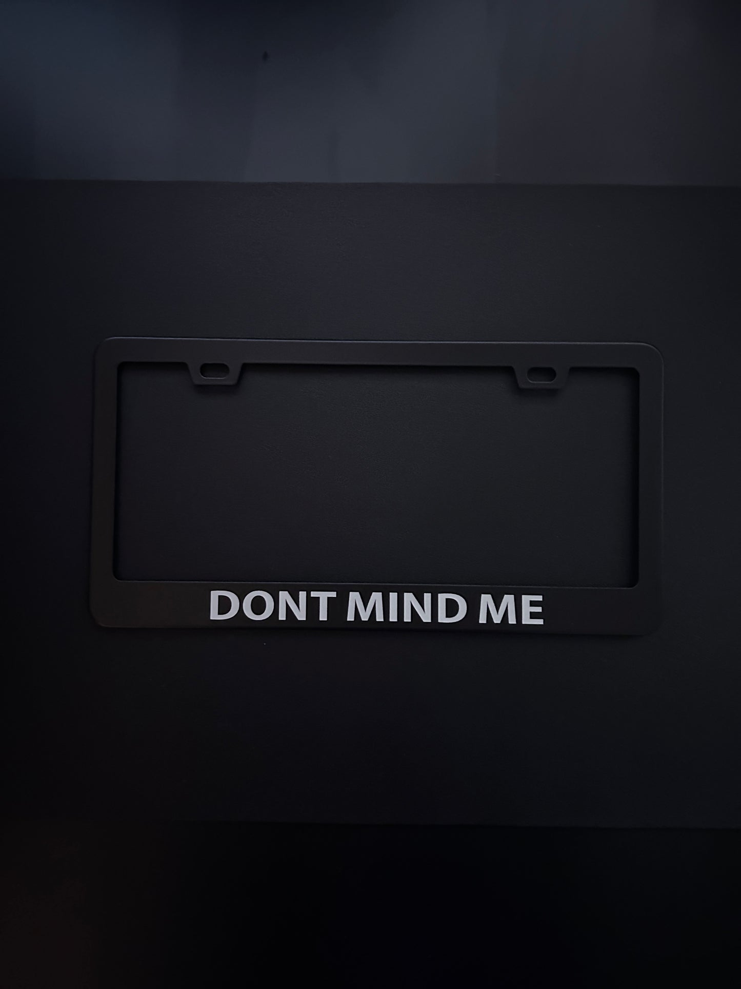 Dont Mind Me Black Stainless Steel License Plate Frame