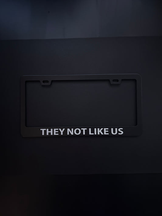 They Not Like Us Black Stainless Steel License Plate Frame